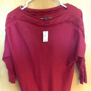 Red boat neckline sweater